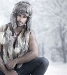 Handsome male wearing furs Stock Photo free download