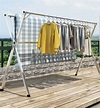 不銹鋼折叠伸縮晾衣架 落地卧室露台可用 可晒被 伸缩室内晾衫架, 傢俬＆家居, 其他, 掛鉤和衣架 - Carousell