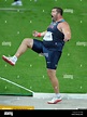 USA's Christian Cantwell celebrates putting the shot 22.03m to regain the lead in the shot put ...