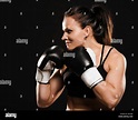 Female fighter ready to fight. Beautiful muscular fitness woman Stock ...