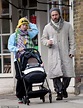 Jude Law enjoys a stroll with daughter Iris and his three-month-old ...