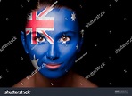 Portrait Of A Woman With The Flag Of The Australia Painted On Her Face ...