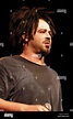 Singer Adam Duritz of the Counting Crows is shown performing on stage ...