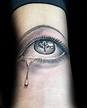 Tattoo Under Eye Men / Black Unfilled Teardrop Tattoo Below Right Eye ...