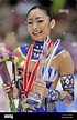 NAGANO, Japan - Japan's Miki Ando smiles with the winner's trophy after ...
