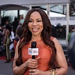 A vision in orange, Dr Precious Moloi Motsepe watches the Day 3 shows ...