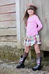 Young Girl Wearing A Hat And Cowboy Boots; Troutdale, Oregon, Usa ...