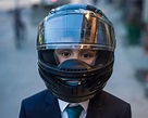 "Boy Wearing Motorcycle Helmet" by Stocksy Contributor "Zoran Milich ...