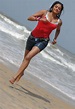 Priyamani Hot Red Bikini Running in Beach Hd Image Gallery - Wiral Beauties
