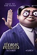 the addams movie poster with an evil man in a suit and tie holding his ...