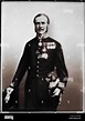 A three-quarter length standing studio portrait of Major-General Sir ...