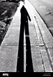 The long, tall shadow Stock Photo - Alamy