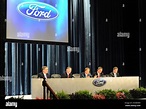 Ford Motor Co. Chairman Bill Ford, center, speaks as CFO Lewis Booth ...
