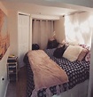 My tiny basement bedroom with a full sized bed placed sideways against ...