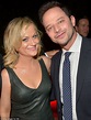 Amy Poehler wears bikini bottoms while walking with her boyfriend Nick ...