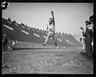 Charley Paddock leaping through finish line at Los Angeles Coliseum ...