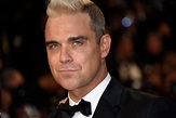 Robbie Williams new album: Take That singer announces Heavy ...