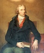 an oil painting of a man in a blue coat and red collar holding a book