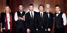 McBusted look all suave in suits and ties for their new shoot