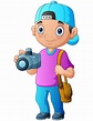 Niño fotógrafo de dibujos animados sosteniendo una cámara | Vector Premium