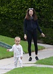 Troian Bellisario in Black Leggings Walks Out with Her Daughter and ...