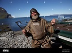 Fisherman in old gear, Bolungarvik town, West Fjords, Iceland Stock ...