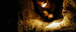 There is a scene in this movie (The Descent), where one of the "cavers ...