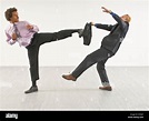 Two business people fighting Stock Photo: 78123759 - Alamy
