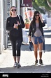 Pregnant Kourtney Kardashian shows off her baby bump while out with her ...
