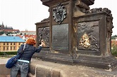 Rubbing the brass plaques on the Charles Bridge in Prague is said to ...