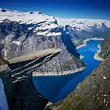 Amazing Famous Norway Trolltunga view point at morning with snow ...