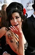 The beautiful story behind the most famous Amy Winehouse tattoo.