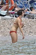 Rebecca Hall Wearing a Red Bikini at the Beach in Taormina 06/13/2016 – celebsla.com