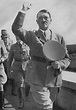 Chancellor Adolf Hitler salutes the crowd assembled in the Zeppelinfeld ...