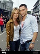 German boxer Felix Sturm and his girlfriend Jasmin pose in the paddock ...