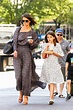 Katie Holmes and daughter Suri Cruise take a walk after breakfast in ...