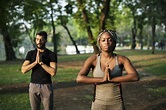 People yoga in a park containing african, african american, and african ...