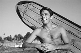 Famous English actor Peter Lawford helps to pioneer surfing at Malibu ...