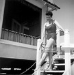 Actress Jane Russell at the beach in a swimsuit in circa 1957. News ...