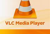 Windows Media Player atau VLC