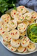 Taco pinwheels made with cream cheese, chicken, cheddar cheese and bell ...