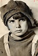Jackie Coogan at the age of six in his well known peaked cap and ...