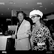 Joan collins and ron kass heathrow airport london hi-res stock ...