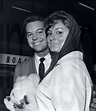 AMERICAN ACTOR RUSS TAMBLYN WITH WIFE AT LONDON AIRPORT ; 3 AUGUST