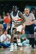 Eddie Hughes of the Denver Nuggets dribbles during a game played ...