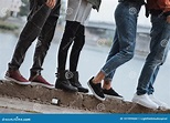 People Standing on Riverside Stock Photo - Image of style, jeans: 101999684