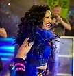 Melina smiling as she walk down the ramp to the ring to face 29 other ...