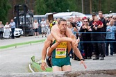 World wife-carrying championship title goes to Lithuanian couple