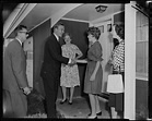 George C. Lodge shaking a woman's hand on a home porch - Digital ...