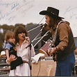 Waylon Jennings, Jessi Colter, & Shooter Jennings on stage together ...